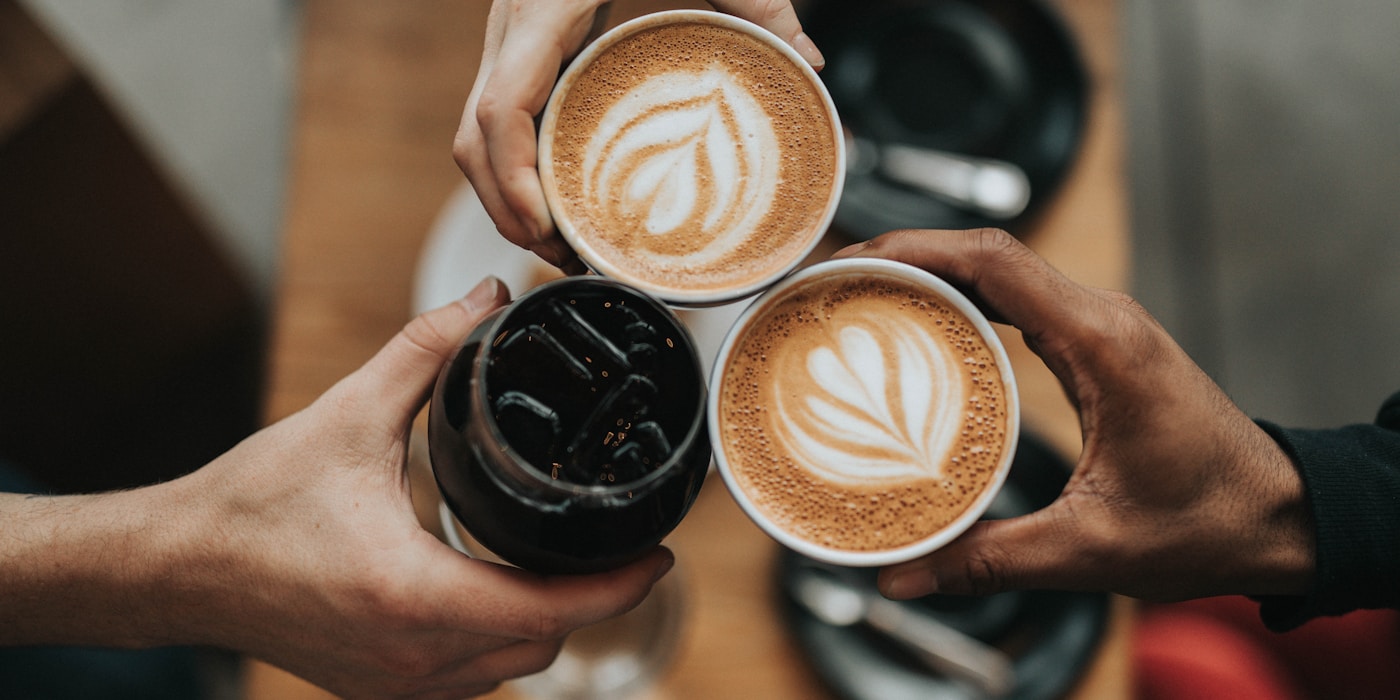 Coffee being brewed in a bright kitchen