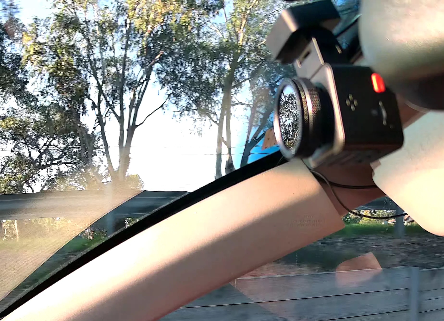 Vantrue E1 Pro dash cam mounted inside a car windshield